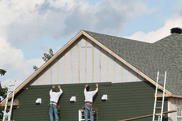Professional Siding technician working in Keller, TX